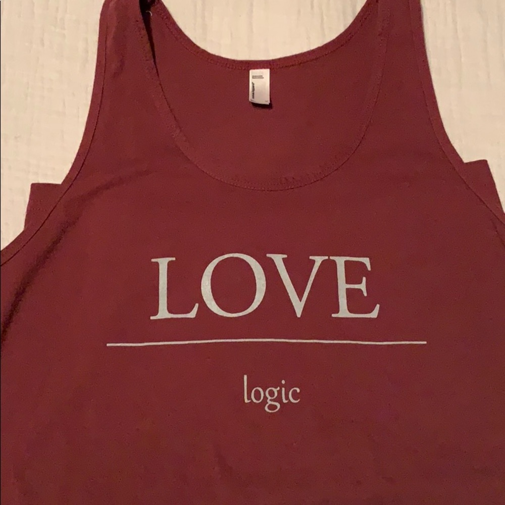 Love Over Logic Tank